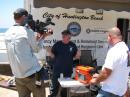 PBS cameraman George Barker, NA1F (an ex-ARRL staffer) interviewing and video-taping Steve Albert, KE6OCE in front of the brand-new Emergency Management and Homeland Security Volunteer Management Response Unit.